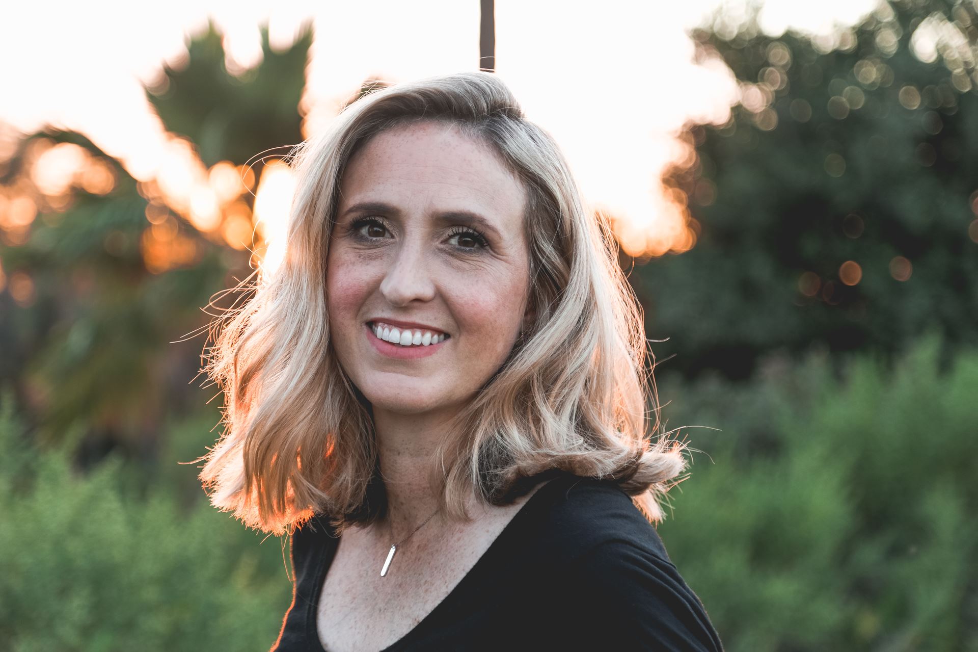 a woman smiling for the camera