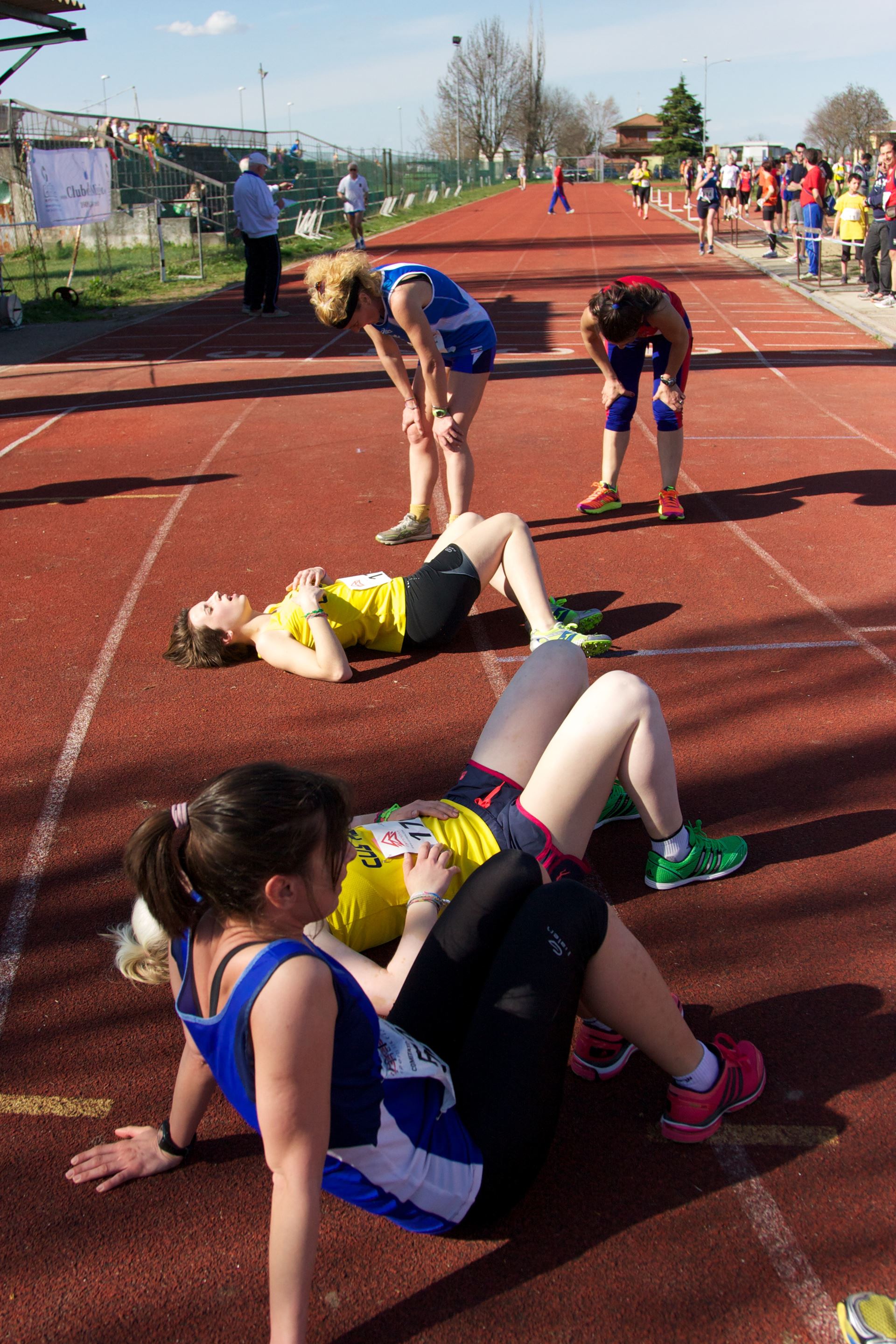 a group of people sitting on the ground